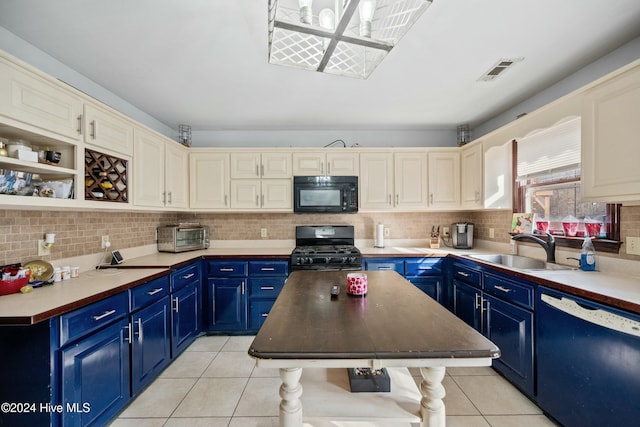 kitchen featuring blue cabinets, sink, and black appliances