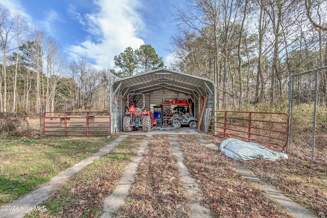 view of outbuilding featuring a carport