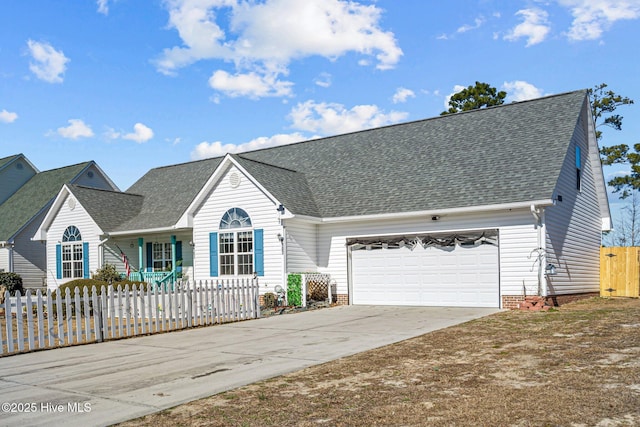 view of front of property featuring a garage and a porch