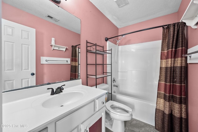 full bathroom with shower / bathtub combination with curtain, tile patterned flooring, toilet, vanity, and a textured ceiling