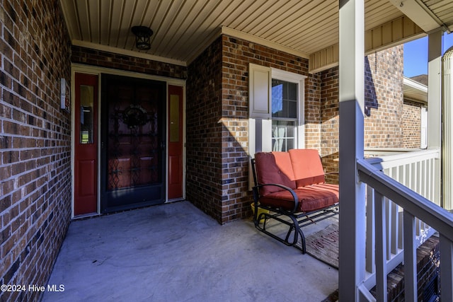 entrance to property with a porch