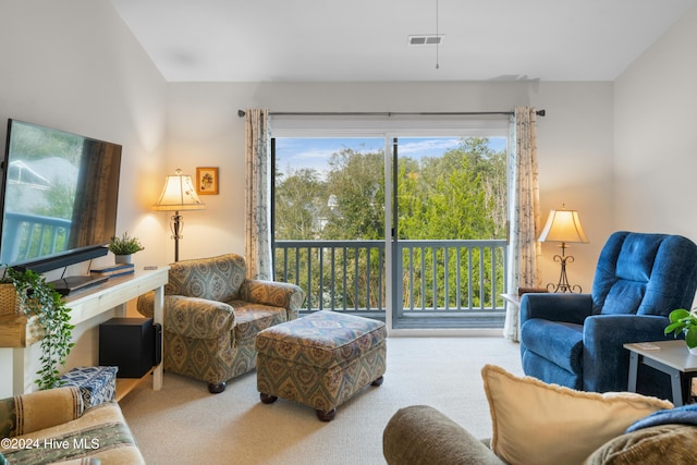 living room with light colored carpet