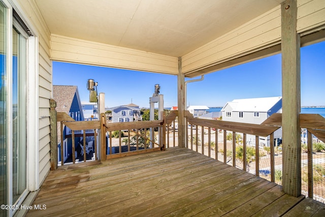 deck featuring a water view