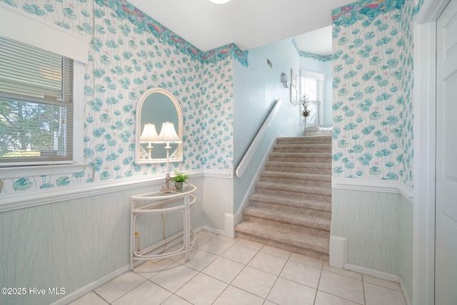 stairs with tile patterned floors