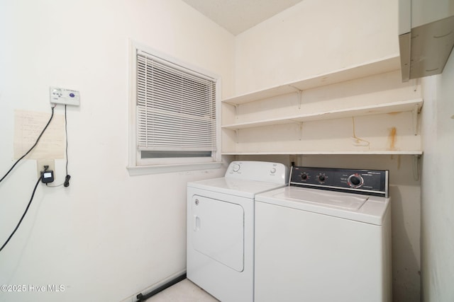 washroom with washer and clothes dryer