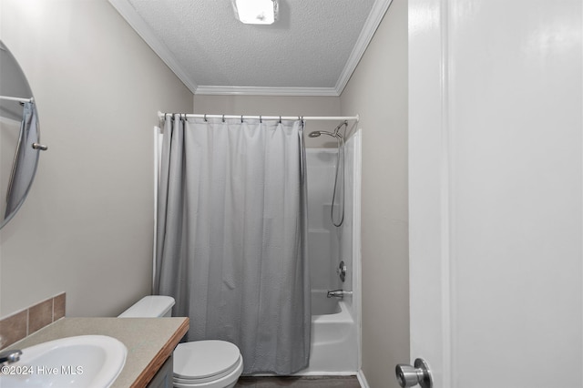 full bathroom featuring a textured ceiling, toilet, shower / tub combo with curtain, vanity, and ornamental molding