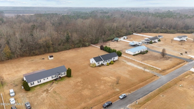 birds eye view of property featuring a rural view