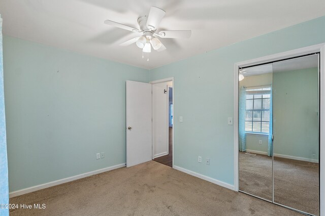 unfurnished sunroom featuring plenty of natural light and ceiling fan