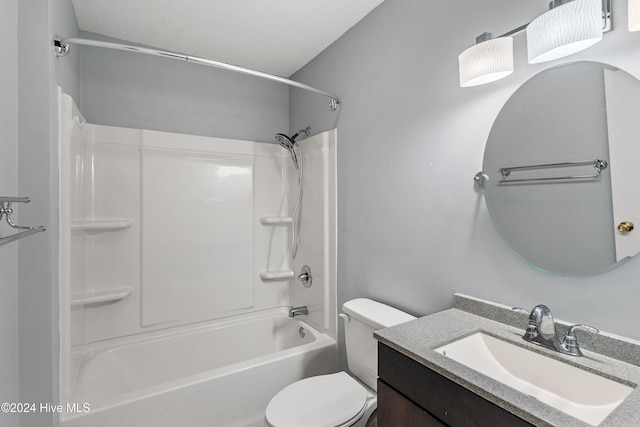 full bath with shower / washtub combination, vanity, and toilet