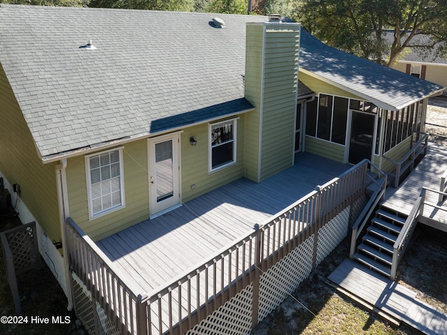 exterior space featuring a sunroom