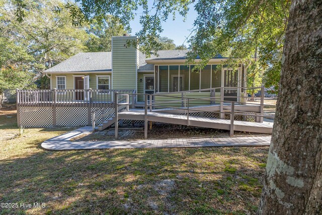 view of home's exterior featuring a sunroom