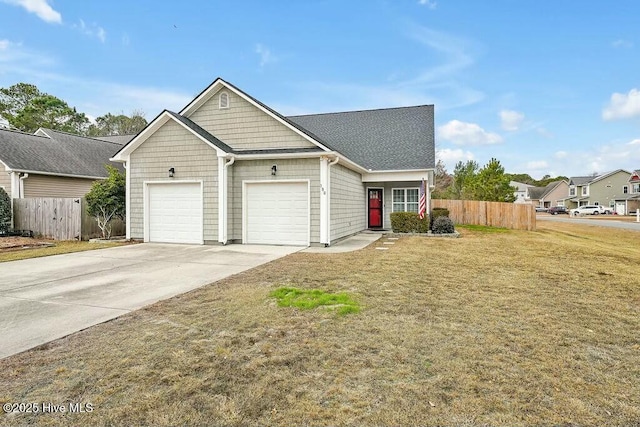 view of front facade featuring a garage and a front yard