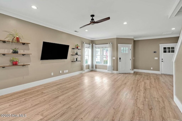 unfurnished living room featuring light hardwood / wood-style floors, ceiling fan, and ornamental molding