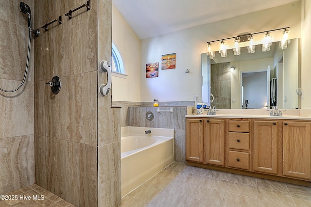 bathroom with vanity, tile walls, tile patterned floors, and plus walk in shower