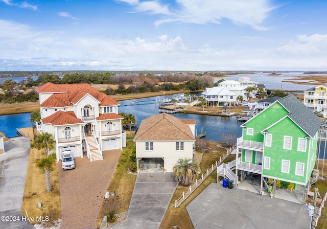 birds eye view of property featuring a water view