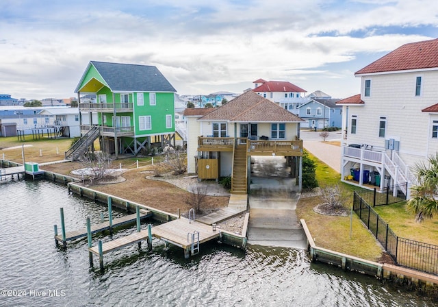 dock area with a deck with water view