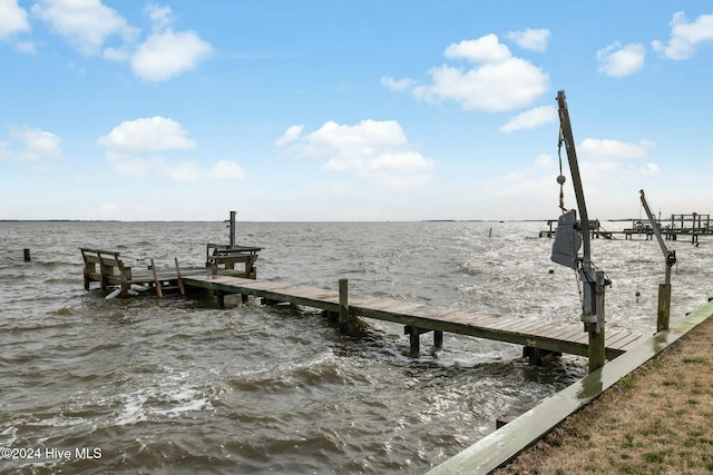 dock area featuring a water view