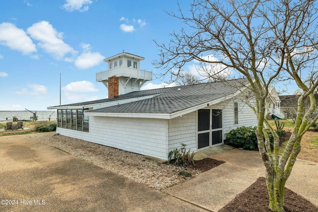 view of side of property featuring a water view