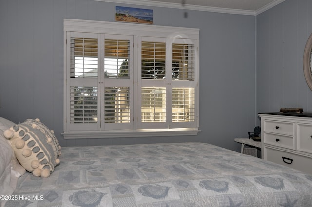 unfurnished bedroom with ornamental molding