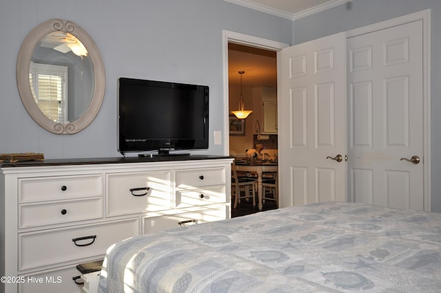 bedroom featuring crown molding