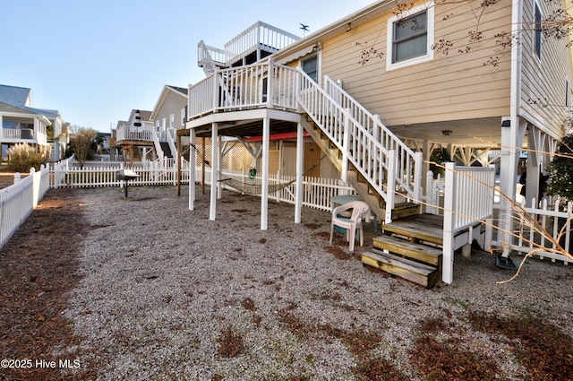 rear view of property with a deck