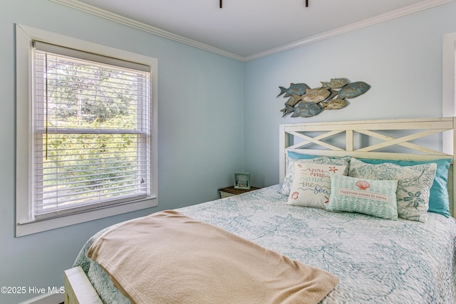 bedroom with crown molding