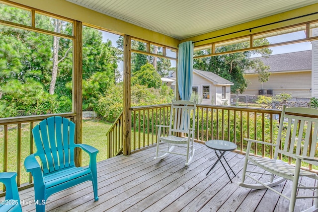 sunroom featuring a wealth of natural light