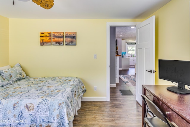 bedroom featuring hardwood / wood-style flooring