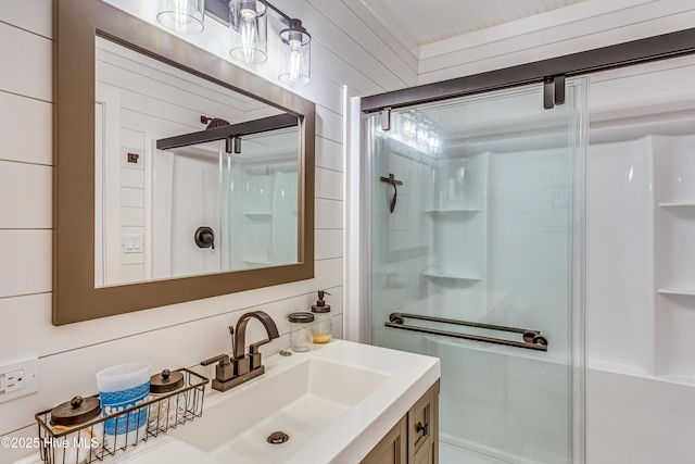 bathroom featuring vanity and walk in shower