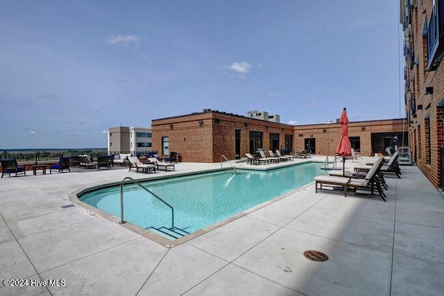 view of pool featuring a patio