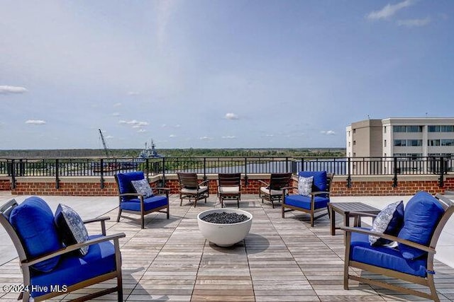 view of patio / terrace with an outdoor fire pit