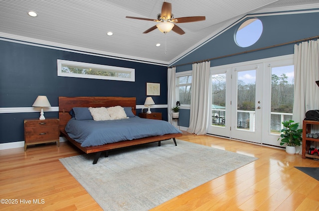 bedroom featuring vaulted ceiling, ceiling fan, ornamental molding, access to exterior, and light hardwood / wood-style flooring