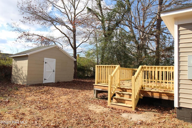 view of yard with a wooden deck