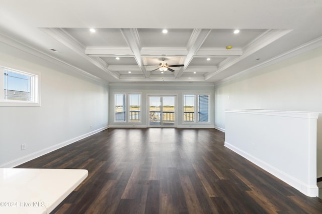 empty room with ceiling fan, plenty of natural light, beamed ceiling, and coffered ceiling