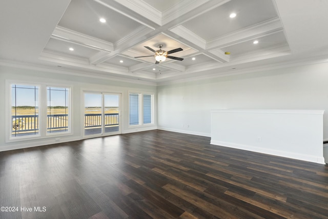 empty room with coffered ceiling, ceiling fan, crown molding, dark wood-type flooring, and beam ceiling