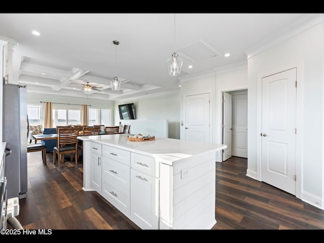 2083 New River Inlet Rd Unit A, North Topsail Beach, NC 28460 - kitchen with ornamental molding, recessed lighting, coffered ceiling, white cabinets, and a ceiling fan