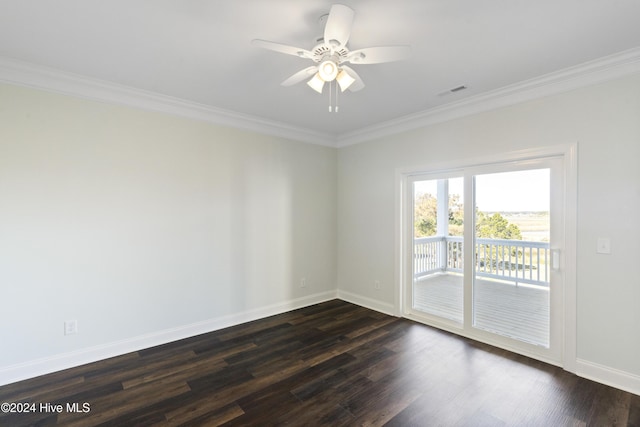 unfurnished room featuring dark hardwood / wood-style floors, ceiling fan, and ornamental molding