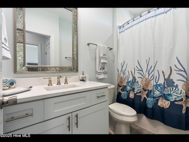 2083 New River Inlet Rd Unit A, North Topsail Beach, NC 28460 - full bath featuring vanity, toilet, and a shower with curtain