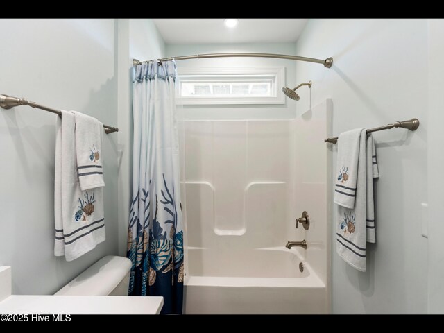 2083 New River Inlet Rd Unit A, North Topsail Beach, NC 28460 - bathroom featuring shower / tub combo with curtain, vanity, and toilet