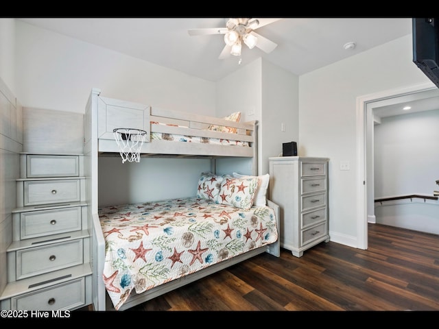 2083 New River Inlet Rd Unit A, North Topsail Beach, NC 28460 - bedroom featuring dark wood-style floors, baseboards, and a ceiling fan