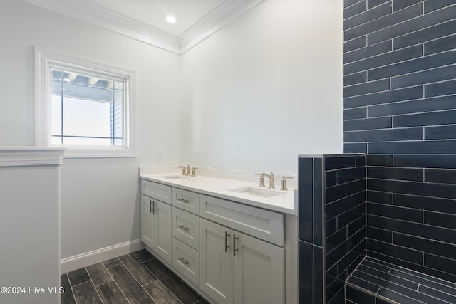 bathroom featuring vanity and ornamental molding