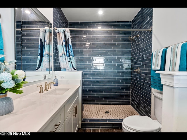2083 New River Inlet Rd Unit A, North Topsail Beach, NC 28460 - full bath with toilet, vanity, tiled shower, and tile patterned floors