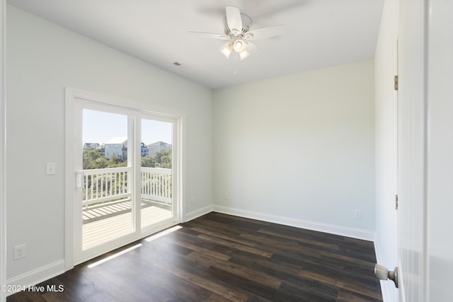 unfurnished room with ceiling fan and dark hardwood / wood-style flooring