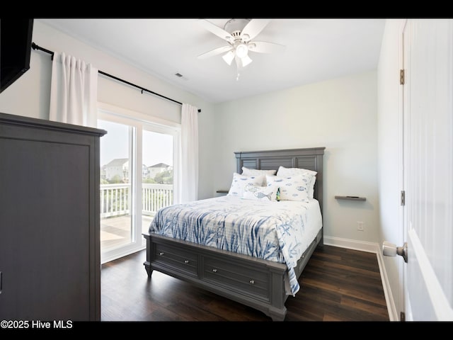 2083 New River Inlet Rd Unit A, North Topsail Beach, NC 28460 - bedroom with access to outside, dark wood-type flooring, baseboards, and ceiling fan
