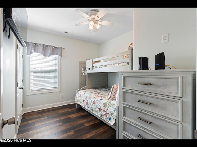 2083 New River Inlet Rd Unit A, North Topsail Beach, NC 28460 - bedroom featuring dark wood finished floors, baseboards, and ceiling fan