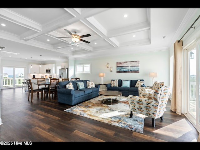 2083 New River Inlet Rd Unit A, North Topsail Beach, NC 28460 - living room featuring healthy amount of natural light, coffered ceiling, dark wood finished floors, ceiling fan, and beam ceiling