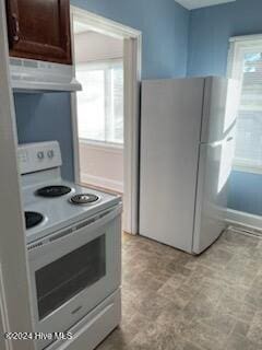 kitchen featuring white appliances