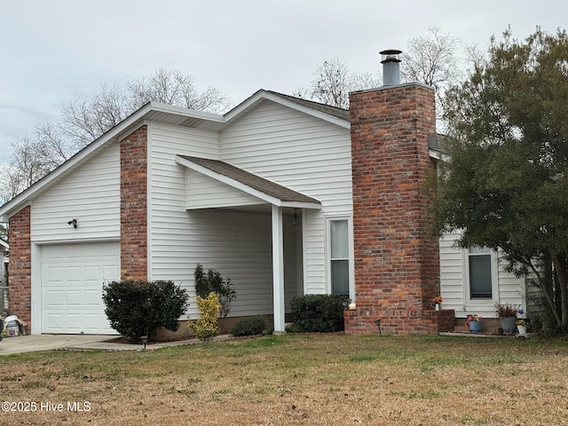 view of home's exterior featuring a lawn and a garage