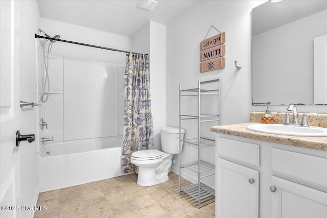 bathroom with shower / tub combo, vanity, and toilet