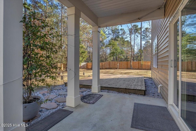 view of patio / terrace featuring fence